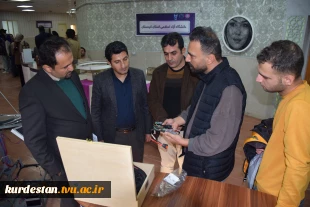 بازدید ریاست دانشگاه ملی مهارت از غرفه فن‌بازار هفته پژوهش و فناوری 5